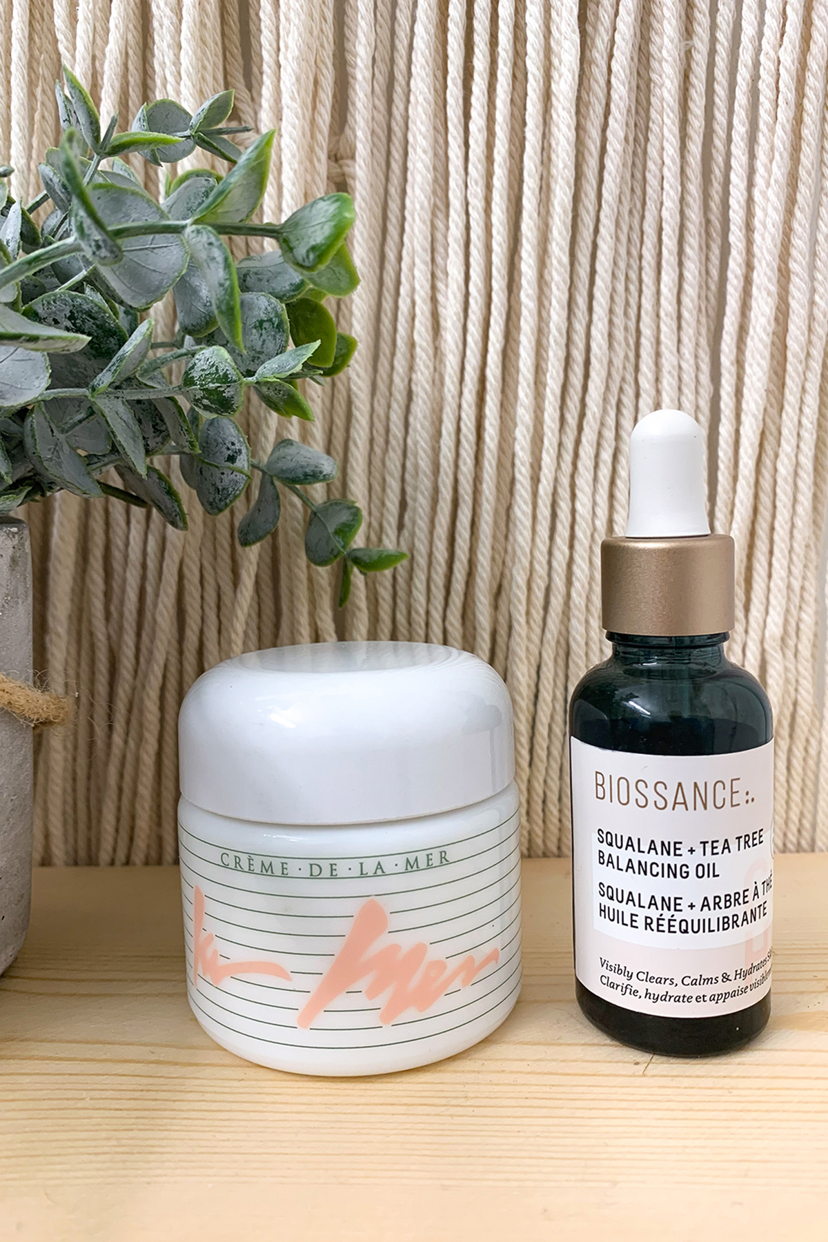 BIOSSANCE Squalane + Tea Tree Balancing Oil and LA MER Crème de la Mer Moisturizer